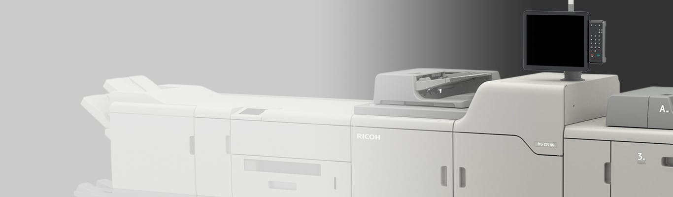 ricoh pro 7210s printer angled on gray background